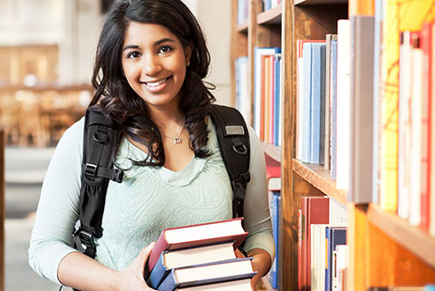 Student Holding Books